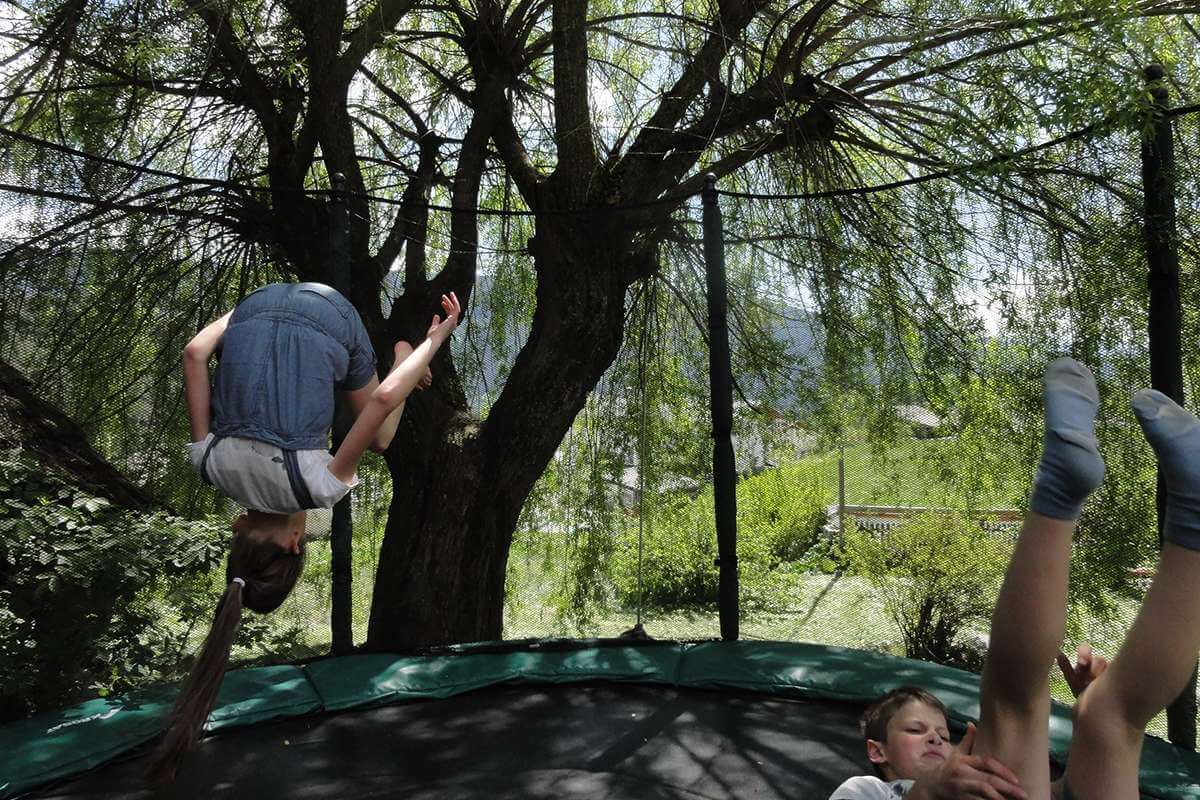 Jumping on a trampoline